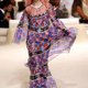 Image for article titled Chanel’s Resort 2015 collection combined sharia-friendly layers and a quilted gold gas-can purse